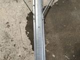 a metal pole that is laying on the ground