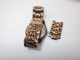 a leopard print watch and two matching bracelets