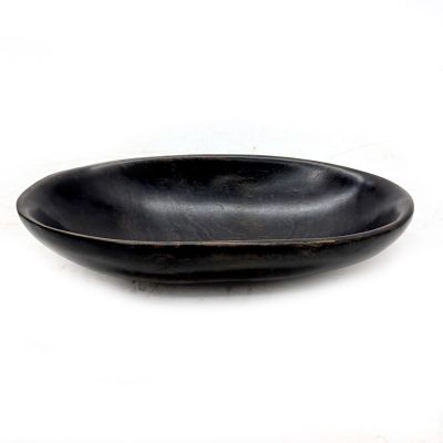 Alexandre NOLL (180 - 1970) Vide-poche ovale en ébène, signé…