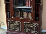 a book shelf with a book on top of it