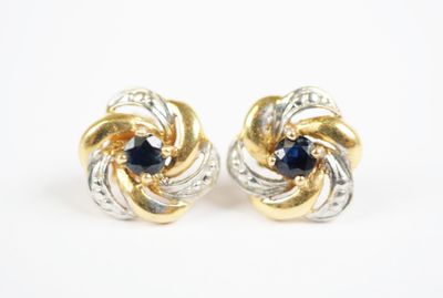 two tone gold and silver earrings with sapphire stones