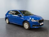 a blue car is parked in a room with a gray floor