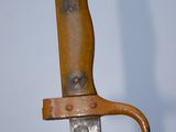 a close up of a knife on a table