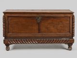 a wooden chest with a door on the top