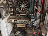 a computer case with a fan and a fan on top of it