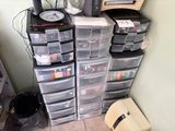 a lot of plastic drawers that are stacked on top of each other