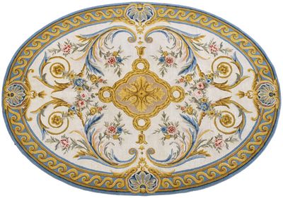 a close up of a rug on a white surface