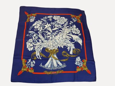 blue and white floral print scarf with red border