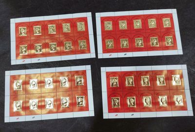 four red and gold stamps with a picture of a man and a woman on them