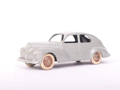 a toy car that is sitting on a white surface