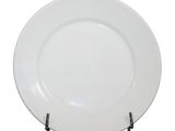 a white plate on a stand on a white background