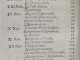 an old book with a list of words on it sitting on a table