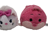 two small stuffed animals that are sitting next to each other