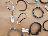 a lot of bracelets that are on a table