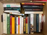 a box full of books that are sitting on a table
