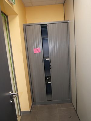 a door in the hallway leading to a closet