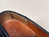 a close up of a pair of shoes that are on a table