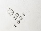 a close up of a piece of metal with writing on it