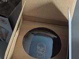 a box that has a cup in it on a table