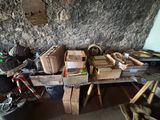 a pile of boxes sitting on top of a wooden table
