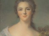 portrait of a woman in a white dress with a yellow ribbon around her neck