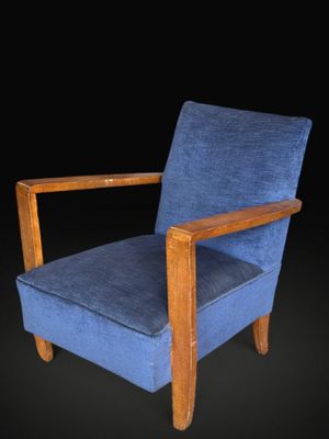 an image of a blue chair against a black background