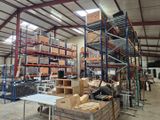 a large warehouse filled with lots of boxes and pallets