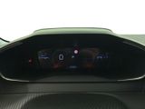 the dashboard of a car with a digital display in the center