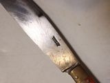 a knife that is sitting on a table
