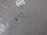 a close up of a plate with a price tag on it
