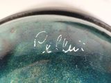 a close up of a bowl with writing on it