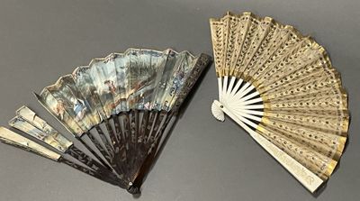 a fan and a fan that are sitting on a table