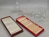 a lot of glassware on the table next to each other
