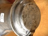 a close up of a metal object with a tag on it