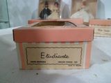 a pink box with a picture of a bride and groom on it