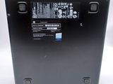 the back of a black laptop with the back panel removed