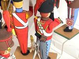 a lot of toy soldiers that are on display