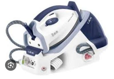 an image of a white and blue steam iron sitting on top of a table