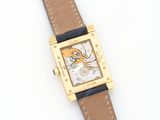 a close up of a wrist watch with a cartoon character on it