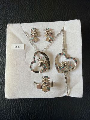 a close up of a piece of jewelry on a cloth
