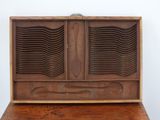 an old wooden desk with a drawer on top of it
