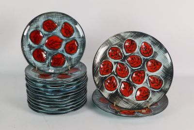 two plates with red hearts on them sitting on a table