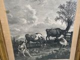 framed picture of a painting of a man and two cows in a field
