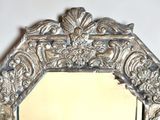 a mirror that is sitting on a table