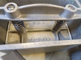 a metal container with springs and springs inside of it