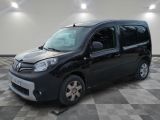 a picture of a small black van parked in a garage