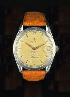 an image of a watch with a brown leather strap