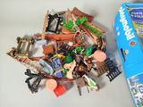a box of playmobil and a box of playmobil