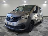 the grey van is parked in the garage on the checkered floor