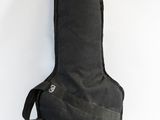an image of a guitar case sitting on a white surface
